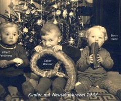 Bonn Hans, Sauer Werner, Elbert Ferdinand  mit Neujahrsbrezel 1937 