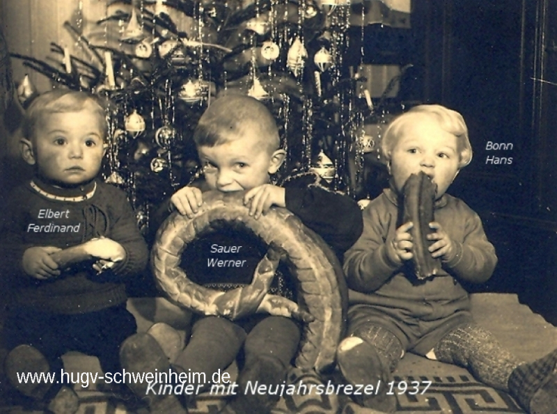 Bonn Hans, Sauer Werner, Elbert Ferdinand  mit Neujahrsbrezel 1937 